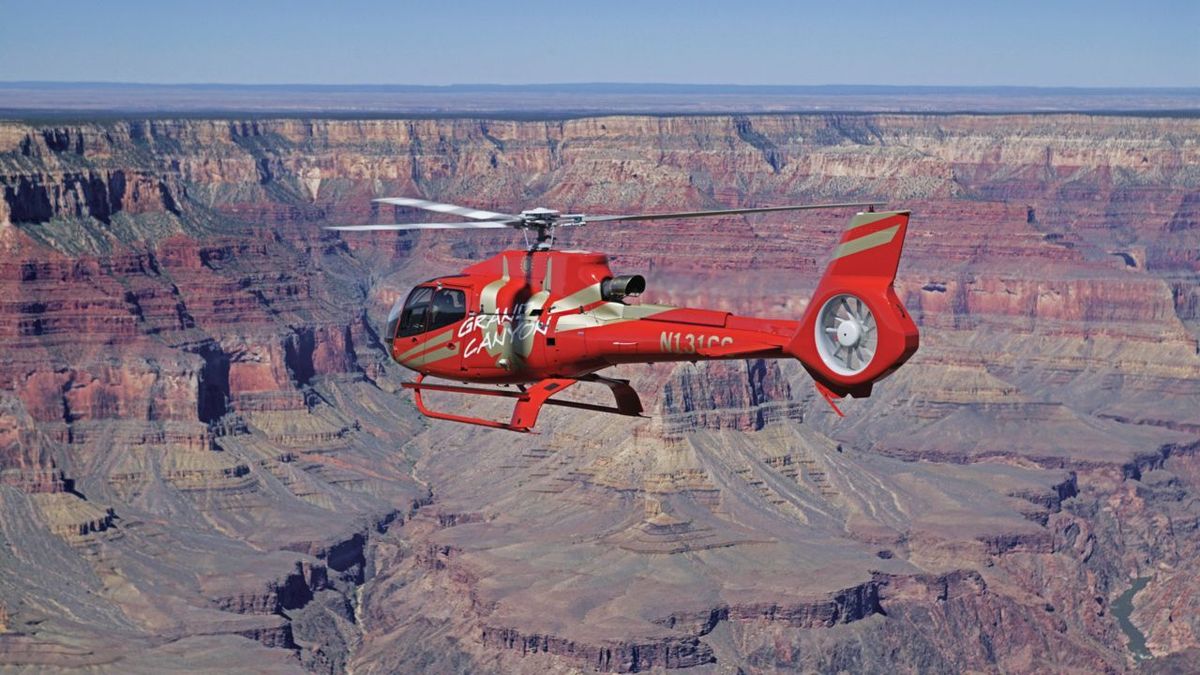 RS13622_HeliCanyon-EC130SouthRim_EDIT-heli-flying-below-the-rim-of-grand-canyon