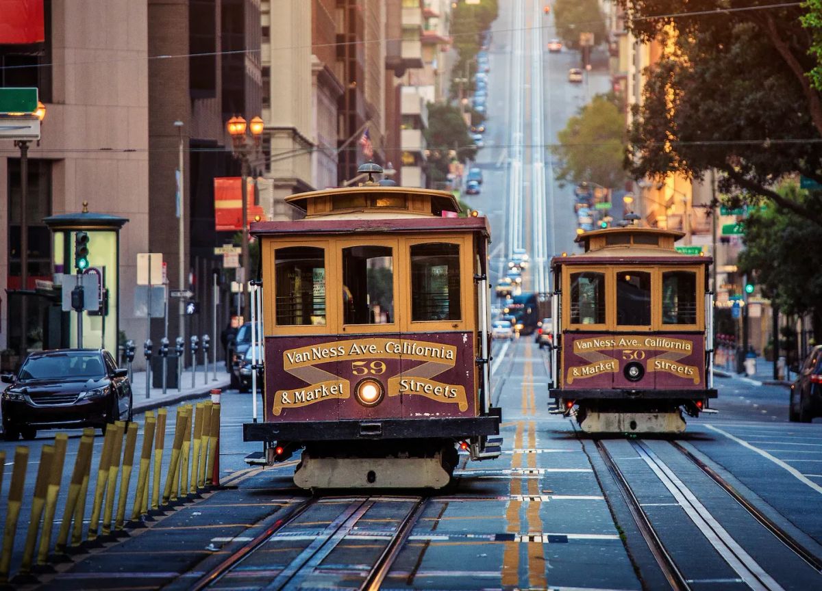 stock-photo-classic-view-of-historic-traditional-cable-cars-riding-on-famous-california-street-in-morning-light-627905945.jpg